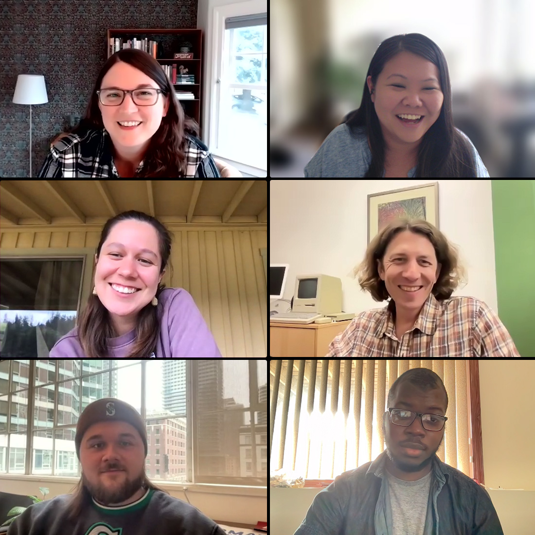 Six people on a zoom call, all smiling.